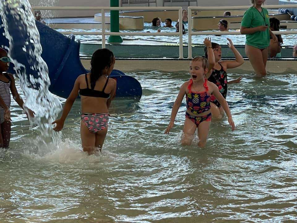 Students playing in water